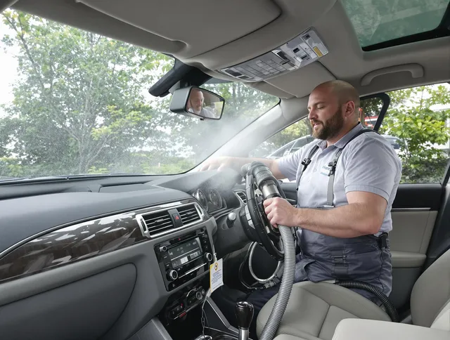 Norwell Air Duct Cleaning specialist performing professional car duct cleaning in Norwell