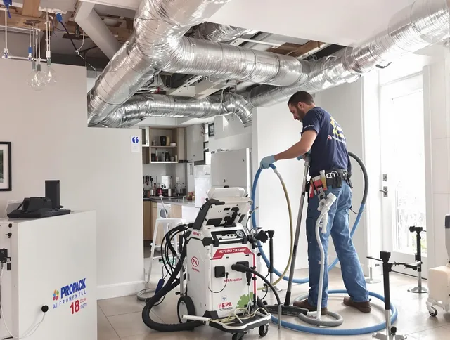Norwell Air Duct Cleaning technician performing advanced pure duct cleaning with specialized equipment in Norwell